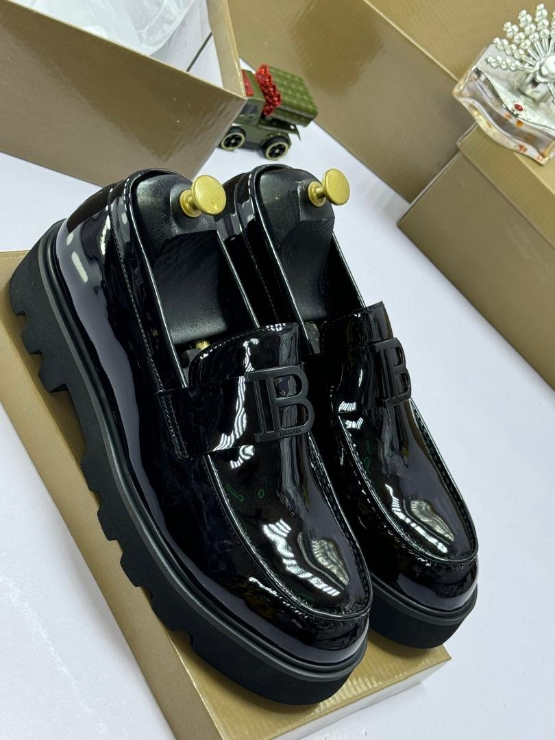 Balmain-Black-Patent-Leather-Lug-Sole-Loafers.jpg Balmain Black Patent Leather Lug Sole Loafers - Image 1