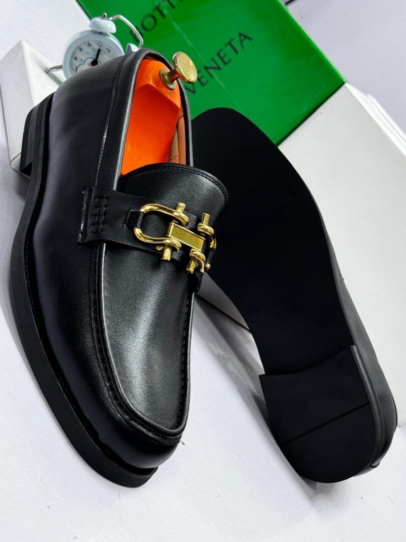Black-Leather-Loafers-with-Gold-Tone-Metal-Strap.jpg Black Leather Loafers with Gold-Tone Metal Strap - Image 1