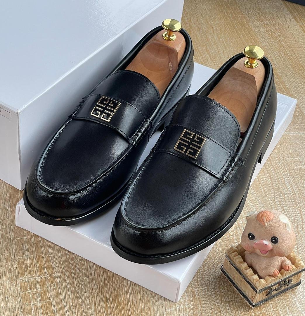 Black-Leather-Loafers-with-Metal-Logo-Plaque-1.jpg Black Leather Loafers with Metal Logo Plaque - Image 1