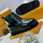 Luxury Designer Boots with Metallic Side Emblem