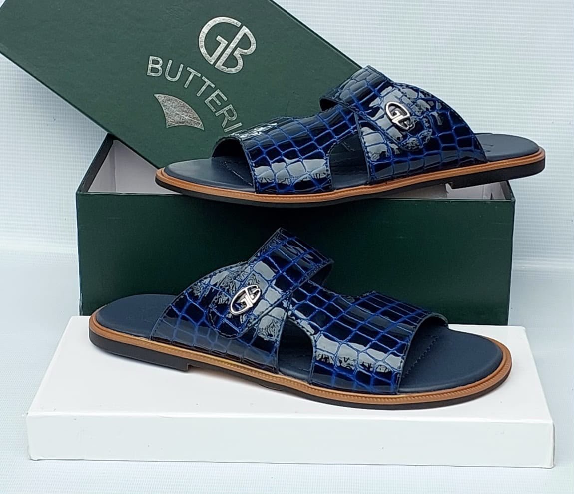 Luxury-Mens-Sandals-with-Metal-Logo-Accent.jpg Luxury Men's Sandals with Metal Logo Accent - Image 1
