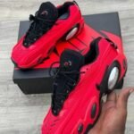 Nike x NOCTA Glide “Bright Crimson” Sneakers