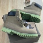 Rugged Leather Boots with Distinct Green Sole