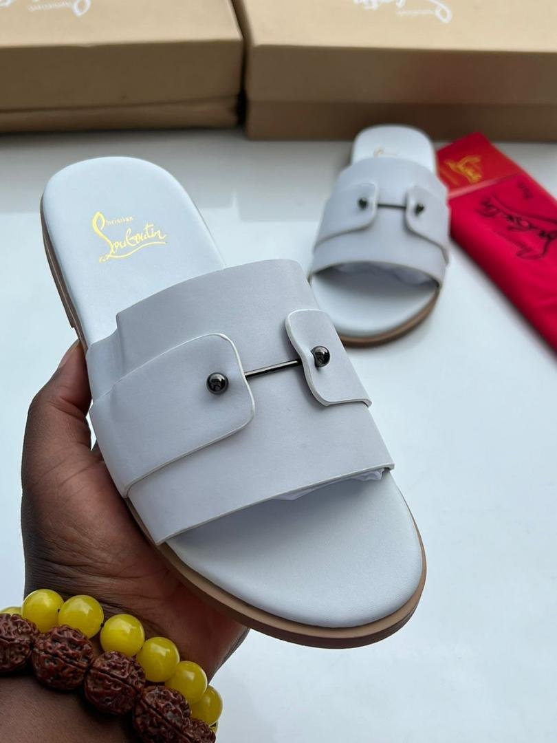 WhatsApp-Image-2026-09-03-at-01.49.05.jpeg Christian Louboutin Chambelimule White Leather Slide Sandals - Image 1