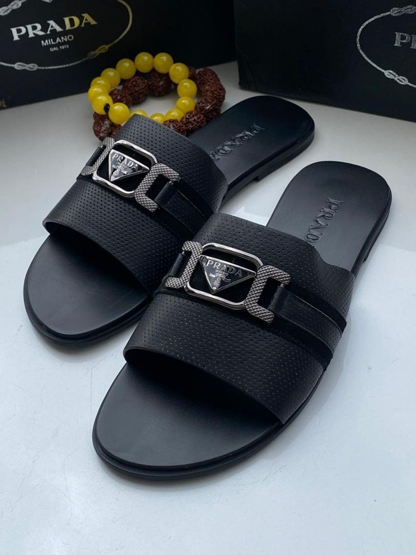 WhatsApp-Image-2026-09-03-at-01.49.43-1.jpeg Prada Black Perforated Leather Slide Sandals - Image 1