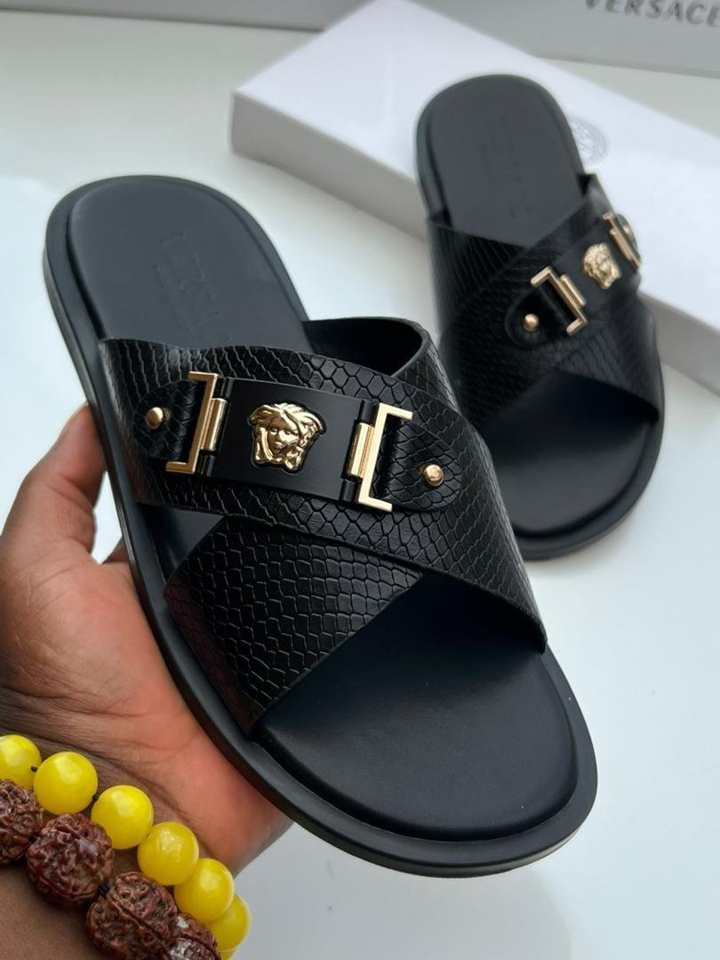 WhatsApp-Image-2026-09-03-at-01.49.46-3-1.jpeg Black Textured Leather Medusa Crossover Slide Sandals - Image 1