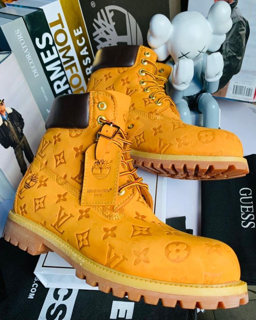 Yellow-Nubuck-Monogram-Embossed-Designer-Boots.jpg Yellow Nubuck Monogram Embossed Designer Boots - Image 1